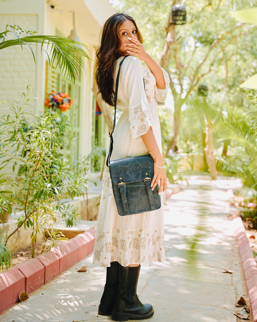blue 100% buffalo leather messenger back with utility and aesthetic looks