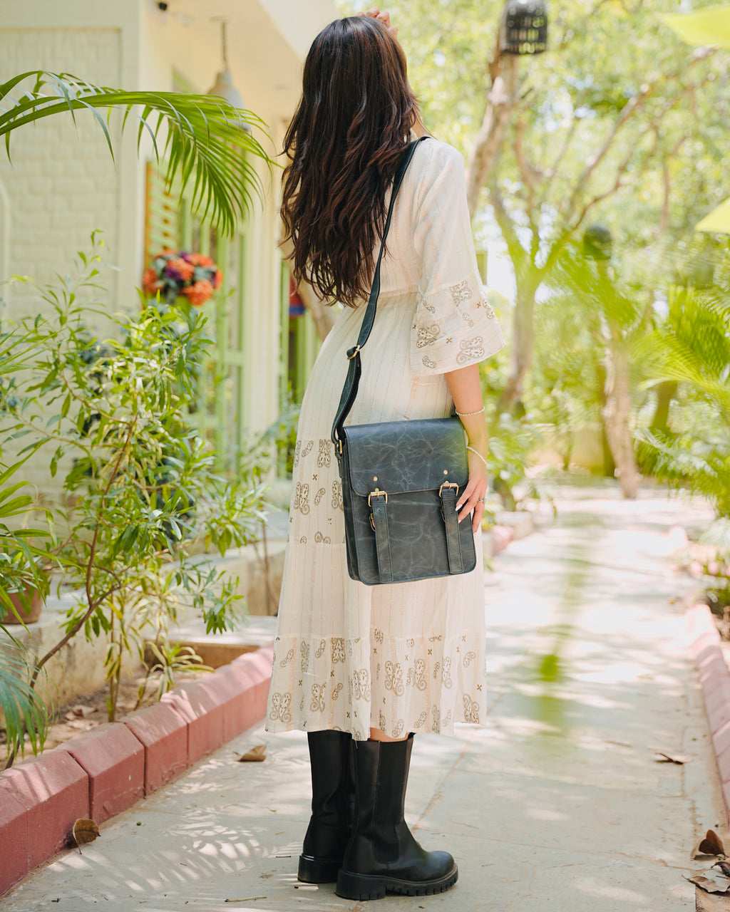 blue 100% buffalo leather messenger back with utility and aesthetic looks